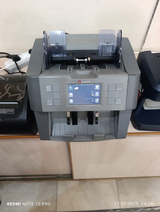 CASSIDA машинка для проверки иностранной валюты на фальшивость.