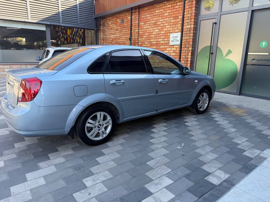 Lasetti 2012 yil 1.6 mator metan gaz