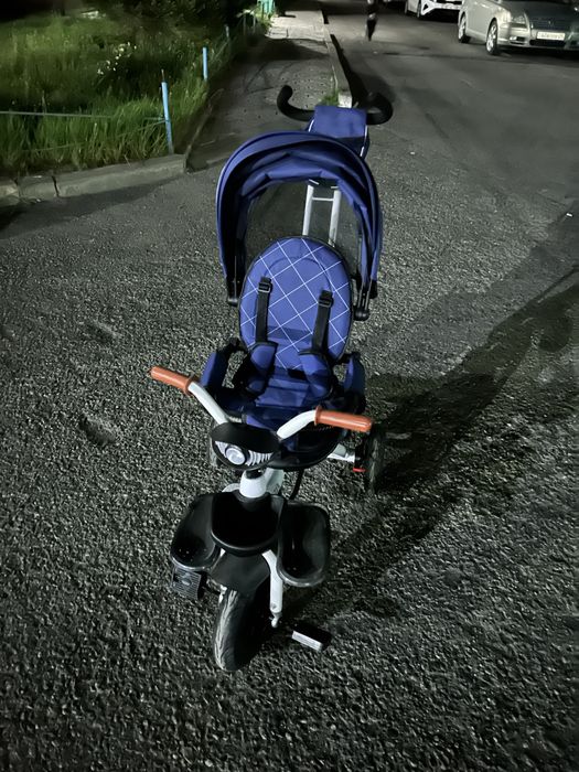 Велосипед- коляска с ручкой