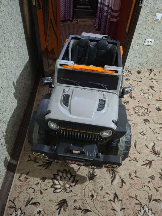 Bolajonlar uchun ozi yurar mashina holati yangi