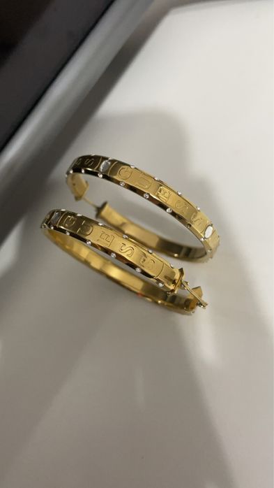 Cercei Guess rotunzi suflati in aur