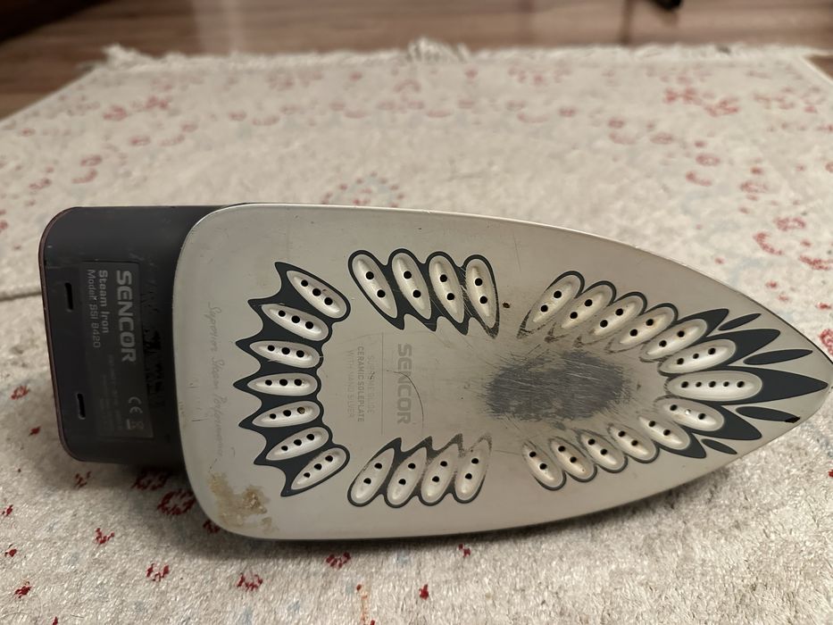 Утюг и гладельная доска