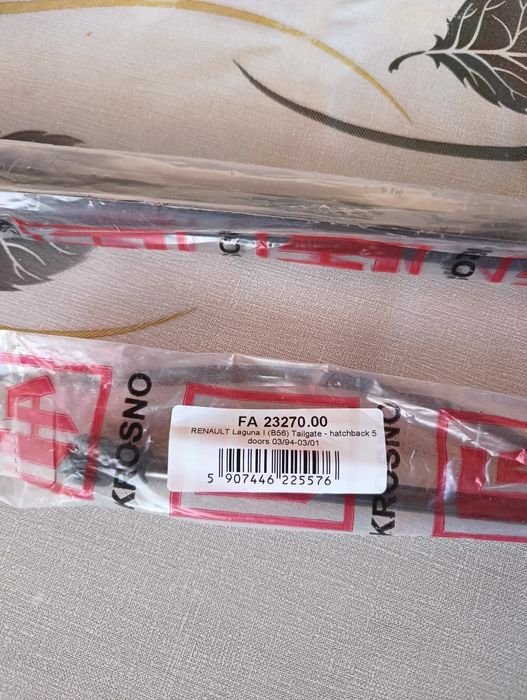 Амортисьори за багажник на Reno Laguna