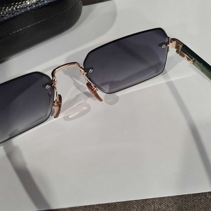 Солнцезащитные очки DB.