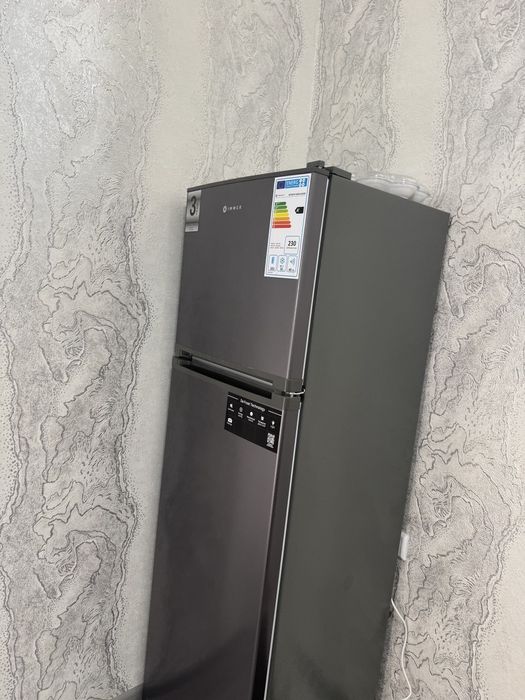 Холодильник практически новый