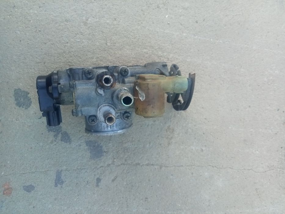 Продам дроссельный заслонка