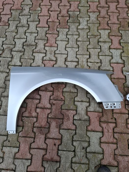 Vând aripi VW PASSAT B6 culoare  negru,maro LC9x și argintiu