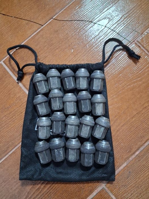 Set 20 piulțe originale ptr.Ford jante aliaj