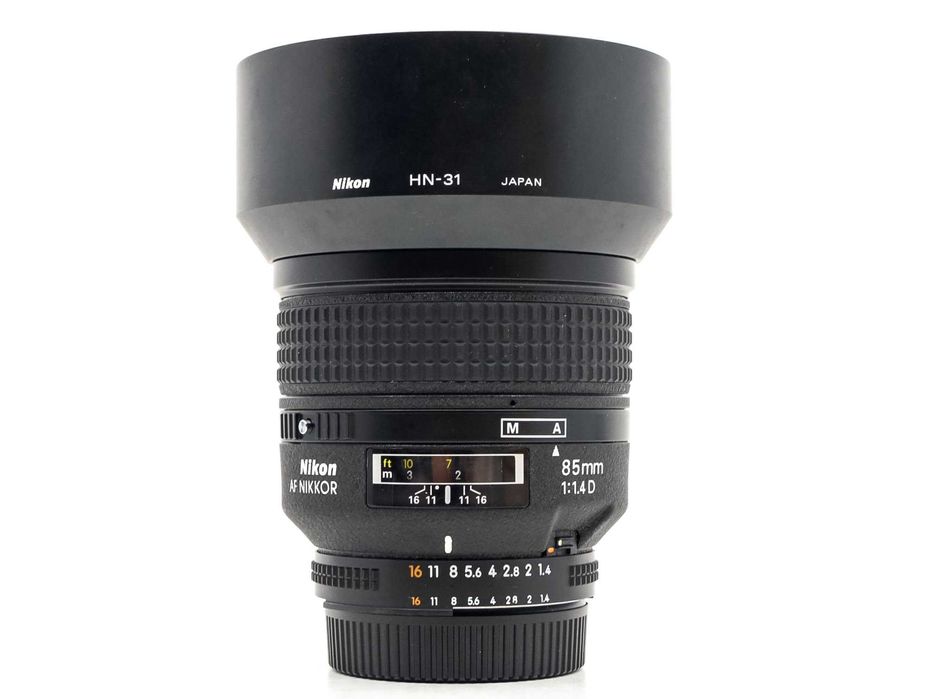 obiectiv nikon 85 1.4 , ca nou ,filtru Uv cadou