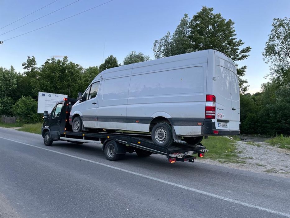 Tractari Auto Sibiu Transport Autoutilitare Utilaje ATV Moto Platforma