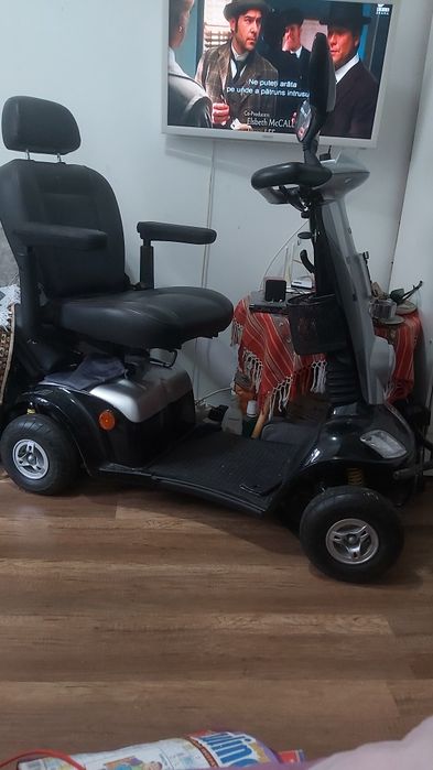 Caruț electric pentru persoane cu dizabilități