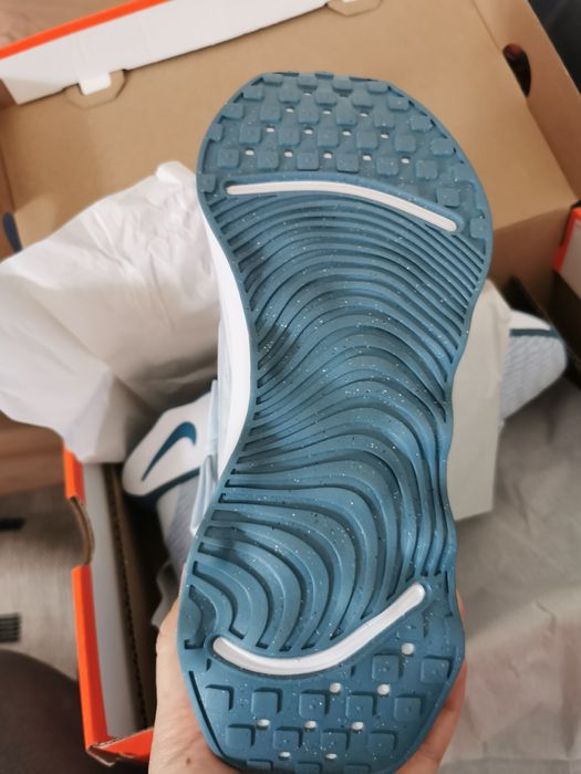 Nike Motiva Blue tint