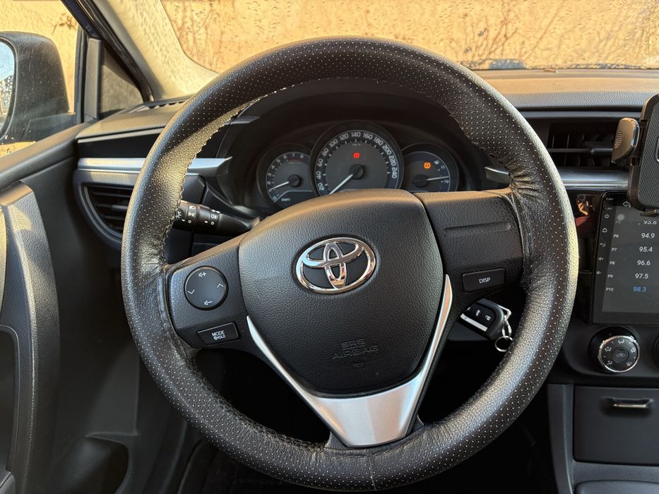 Toyota Corolla  inmatriculata,benzina stare foarte buna ,proprietar!