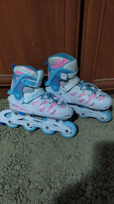 Роликовые коньки