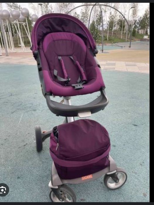 Коляска Stokke с колечком внизу