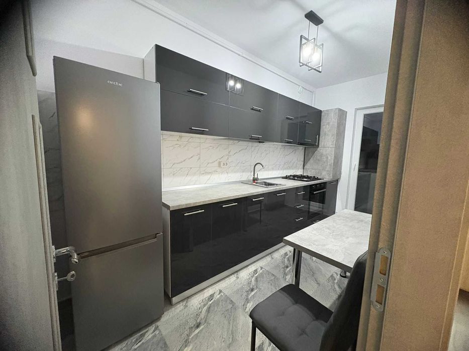 Garsoniera cu loc de parcare inclus, prima inchiriere