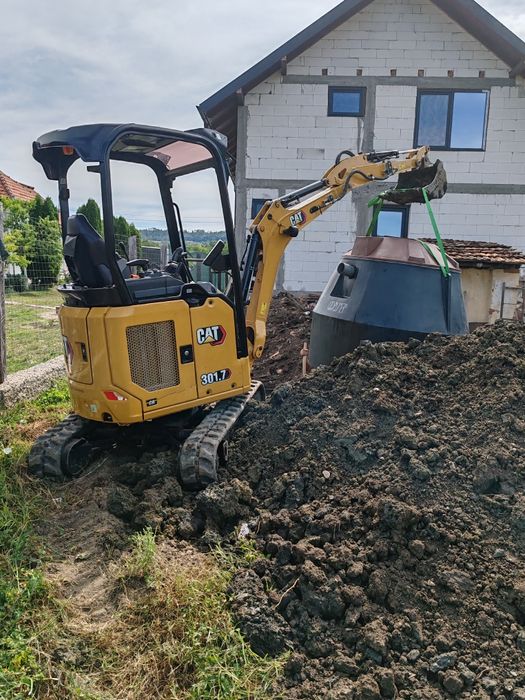 Domolari excavari miniexcavator 2 tone cu picon în tot jud arges