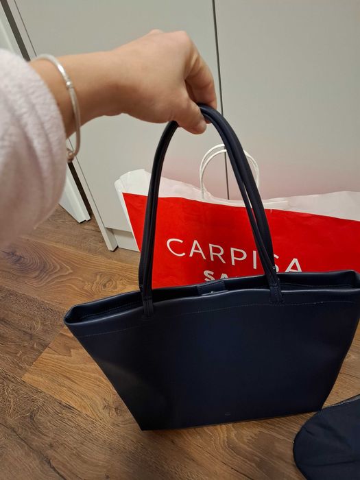 Posetă nouă Caprisa