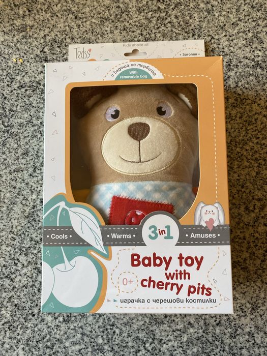Играчка с черешови костилки при колики
