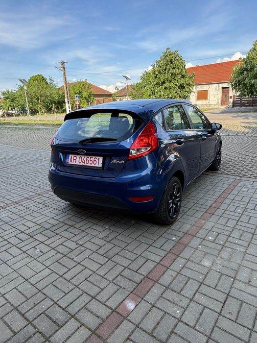 Ford Fiesta Titanium 2010 1.3 benzină, motor clasic fară turbo Euro 5, are numere roșii valabile, ofer fiscal rapid la vânzare.