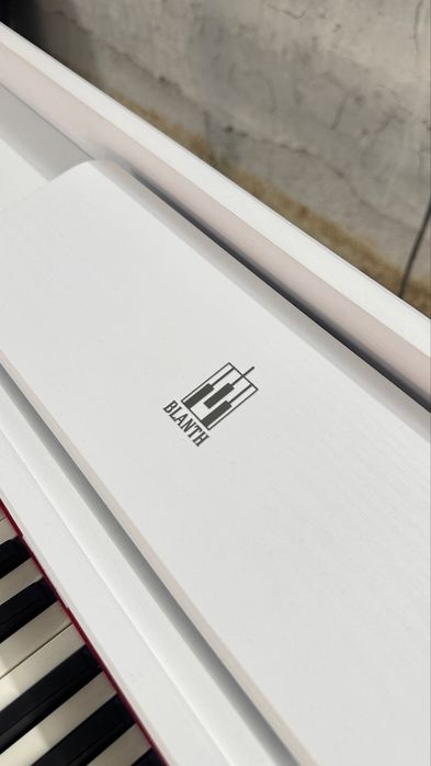 Эллектронная пианино