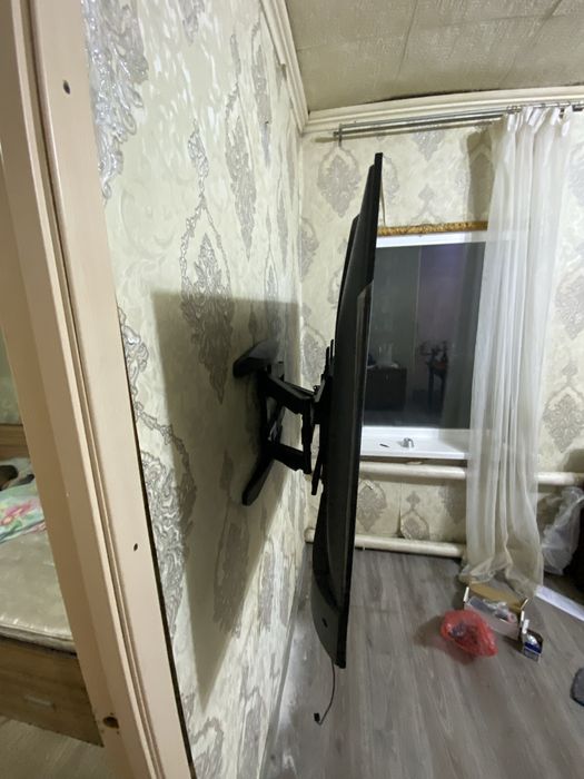 Установка телевизора на стену