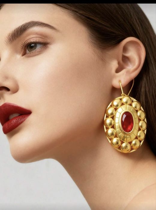 Vand cercei cu diamant rosu