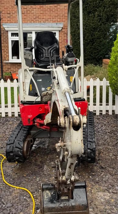 Мини багер Takeuchi