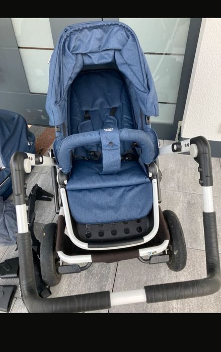 Cărucior + scoică + bază Isofix.