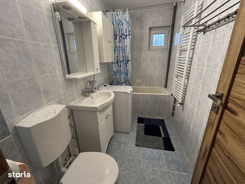 Inchiriez apart.3 cam.central,in spate la BCR,modern,centrala proprie