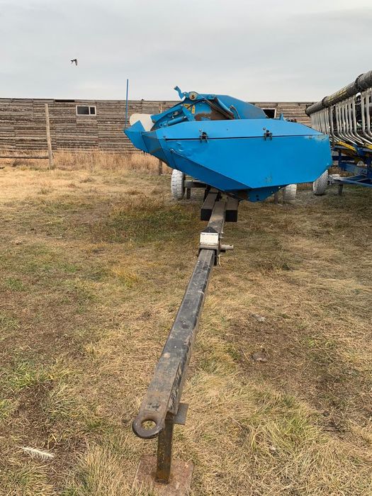 Очесывающая жатка