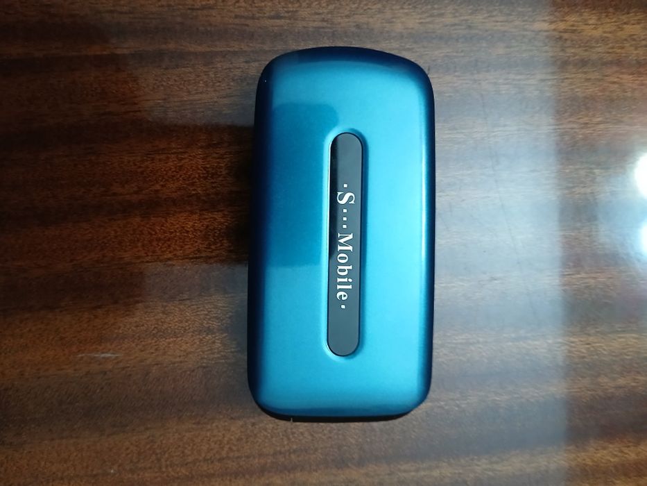 Кнопочный ,телефон.