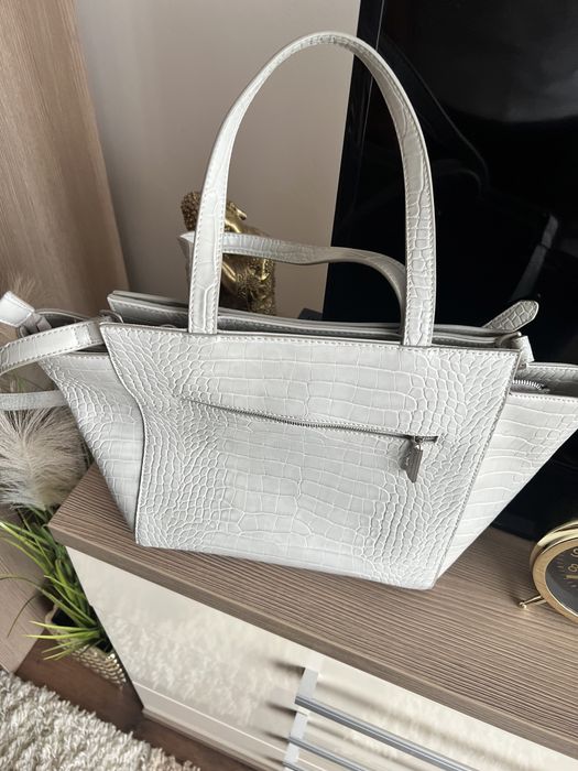 Poseta dama noua ,fără eticheta .culoare gri .Cumpărată din Germania!