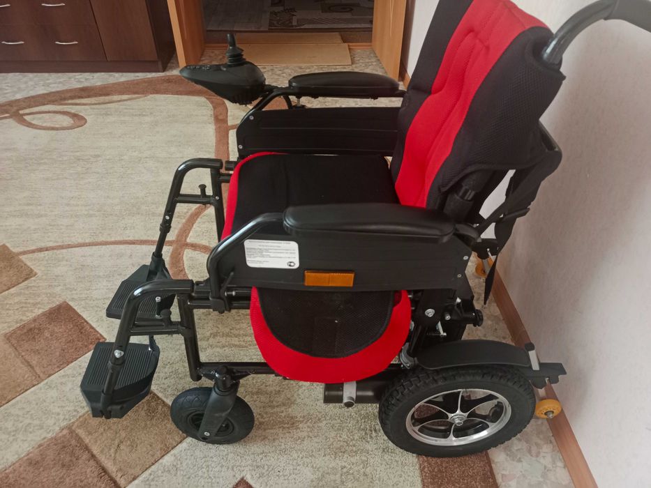 Электрическая инвалидная коляска