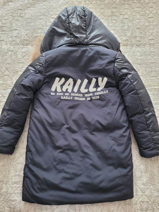 Продам зимний пуховик