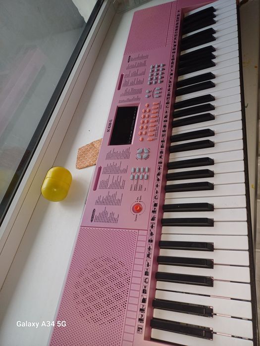 Музыкальный синтезатор пианино