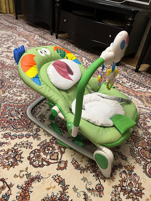 Продам жезлонг Chicco