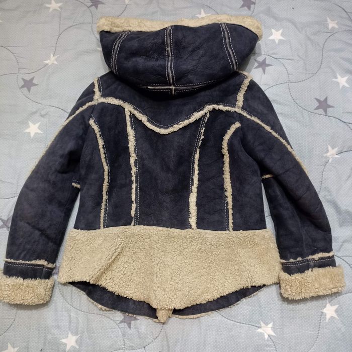 Короткая дублёнка - косуха для девочки 7-9 лет.