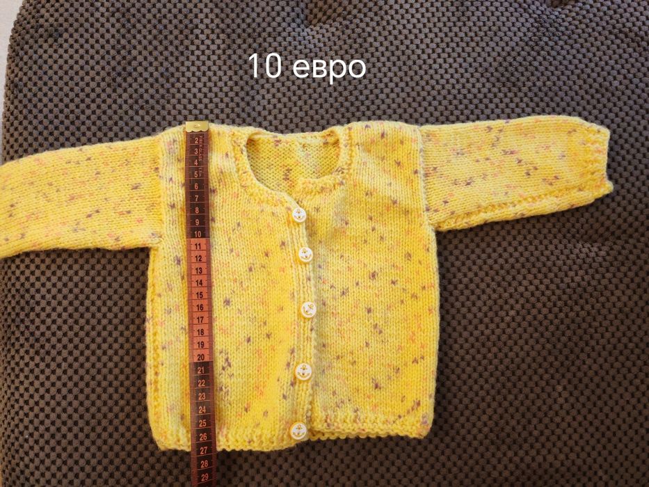 Бебешки плетени жилетки