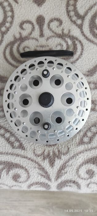 Катушка рыболовная.