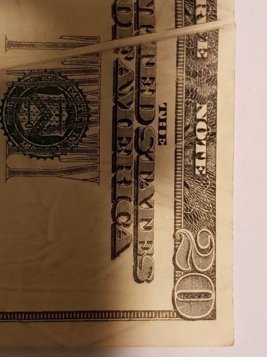 Много рядка 20 доларова банкнота с дефект при отпечатването