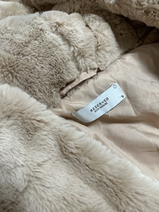Пухен елек Reserved