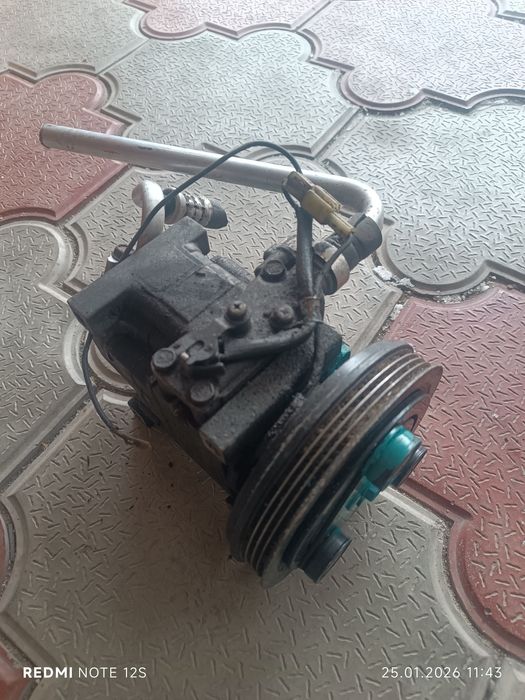 Компрессор кондиционера Мазда 323