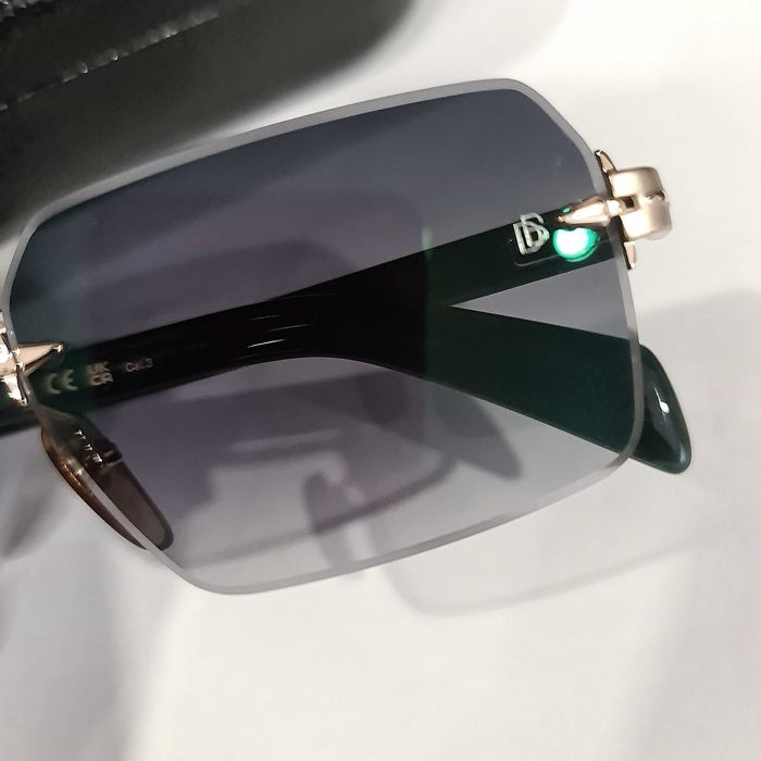 Солнцезащитные очки DB.