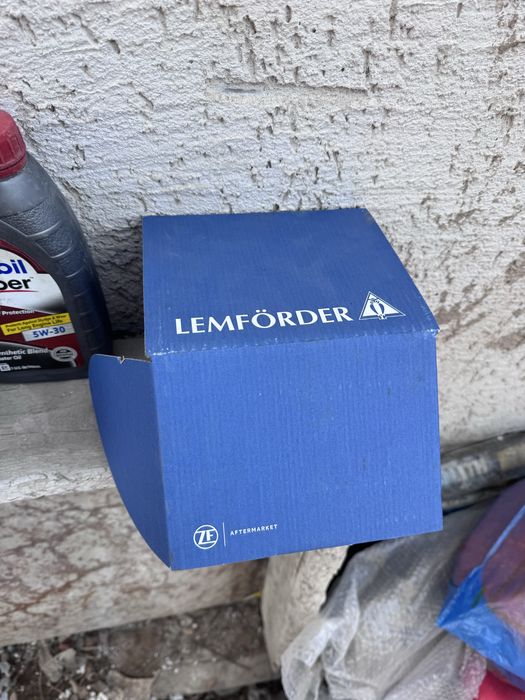 Продам амортизатор бмв е38 перед левый новый и чашка