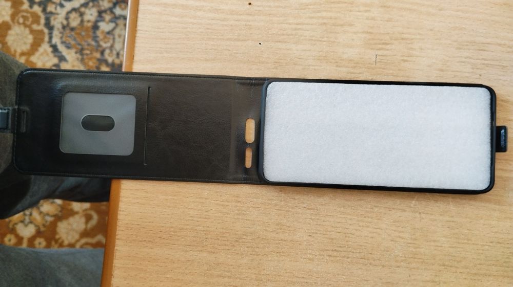 Продам вертикальный чехол для REDMI 15