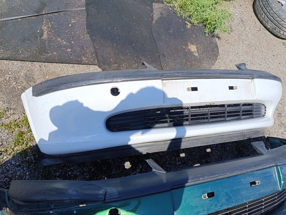 Бампера переднии на Опель Вектра В