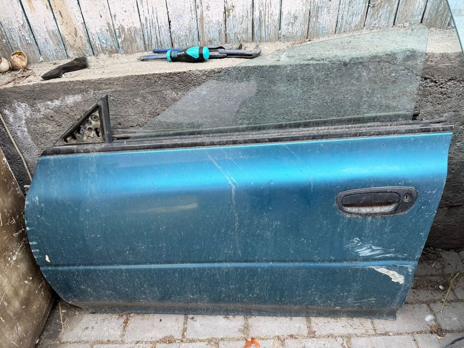 Двери  на Subaru Impreza