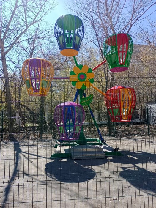 Продам карусель Ромашка