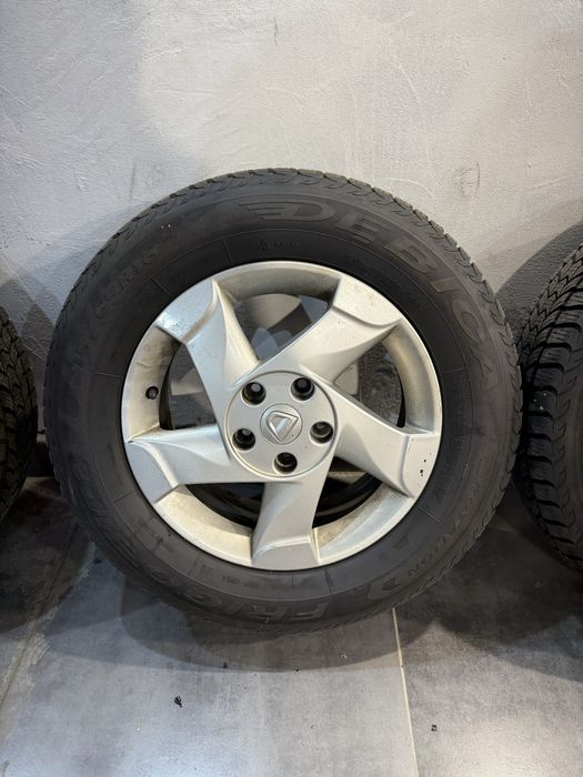 Roti Dacia Duster 1 si 2 2010-2023 cu avelope iarna Debica 215 65 r16